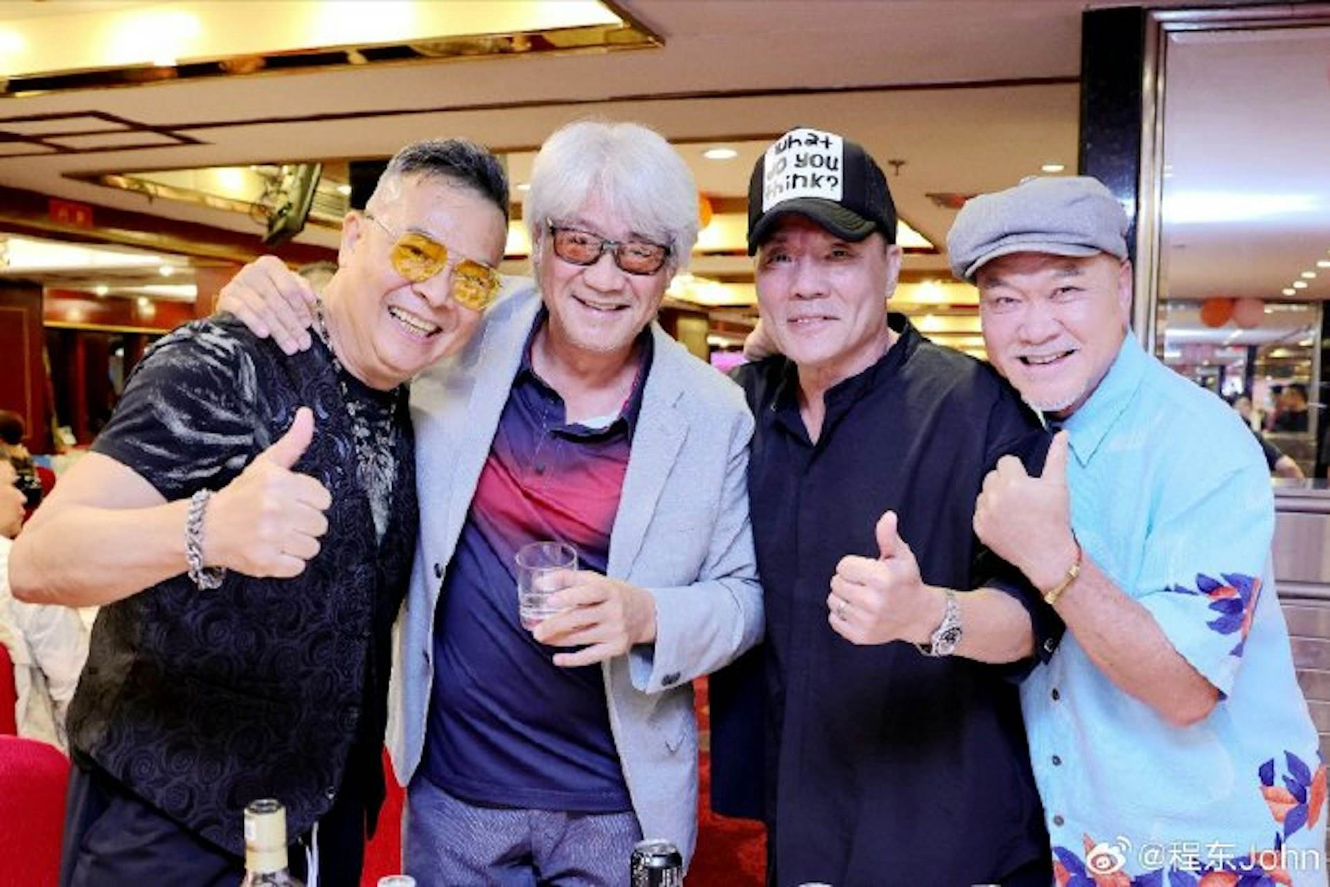 尹揚明(左二)出席澳門忠信體育會52週年會慶。(圖/翻攝自微博)
