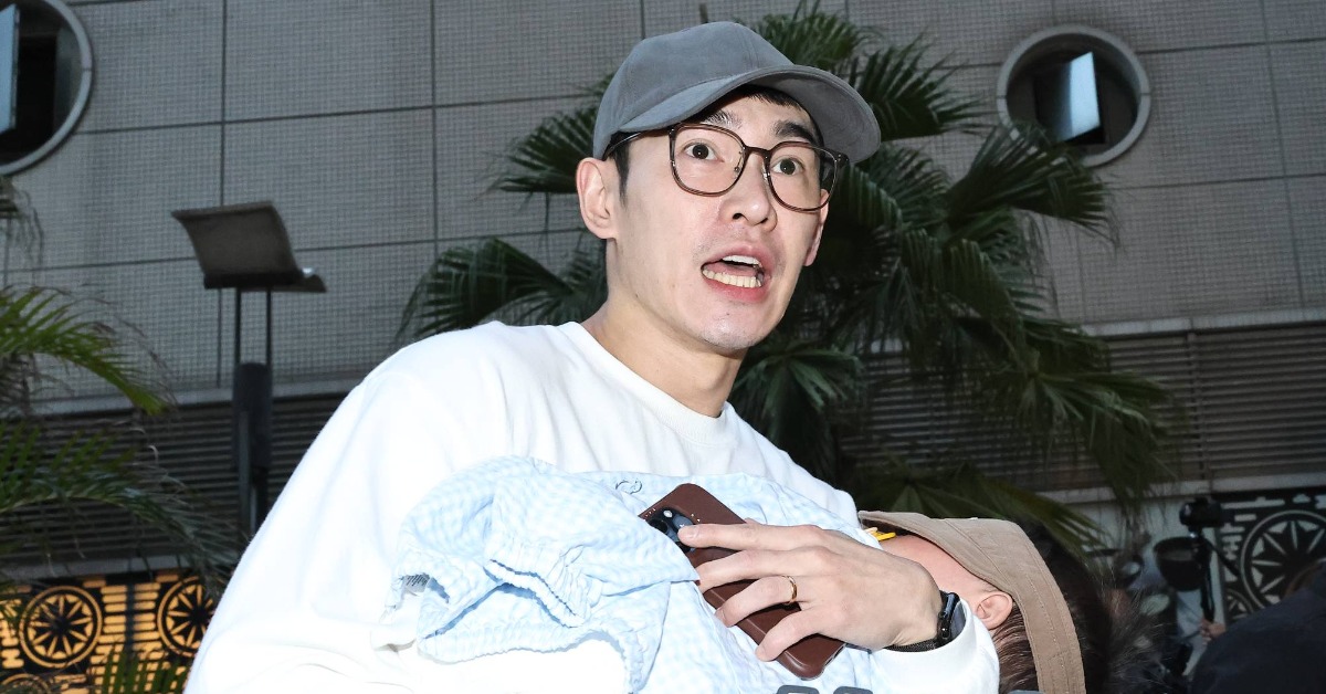 張書豪抱著兒子現身禾浩辰與吳品潔的婚宴。（圖／東森娛樂）