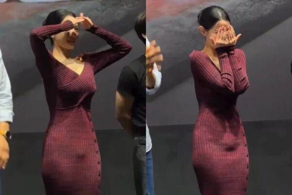 申知原疑似注意到衣服的問題，頻繁用手遮擋腹部。（圖／翻攝自韓網）